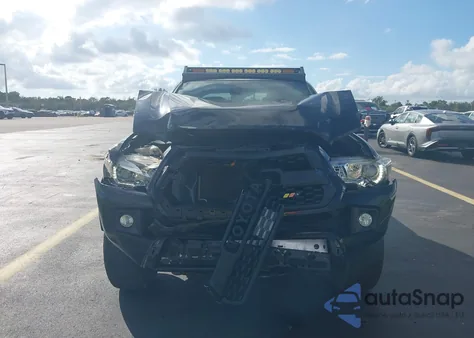 2018 Toyota Tacoma Trd Off Road from USA, damaged, VIN 3TMAZ5CN7JM077607